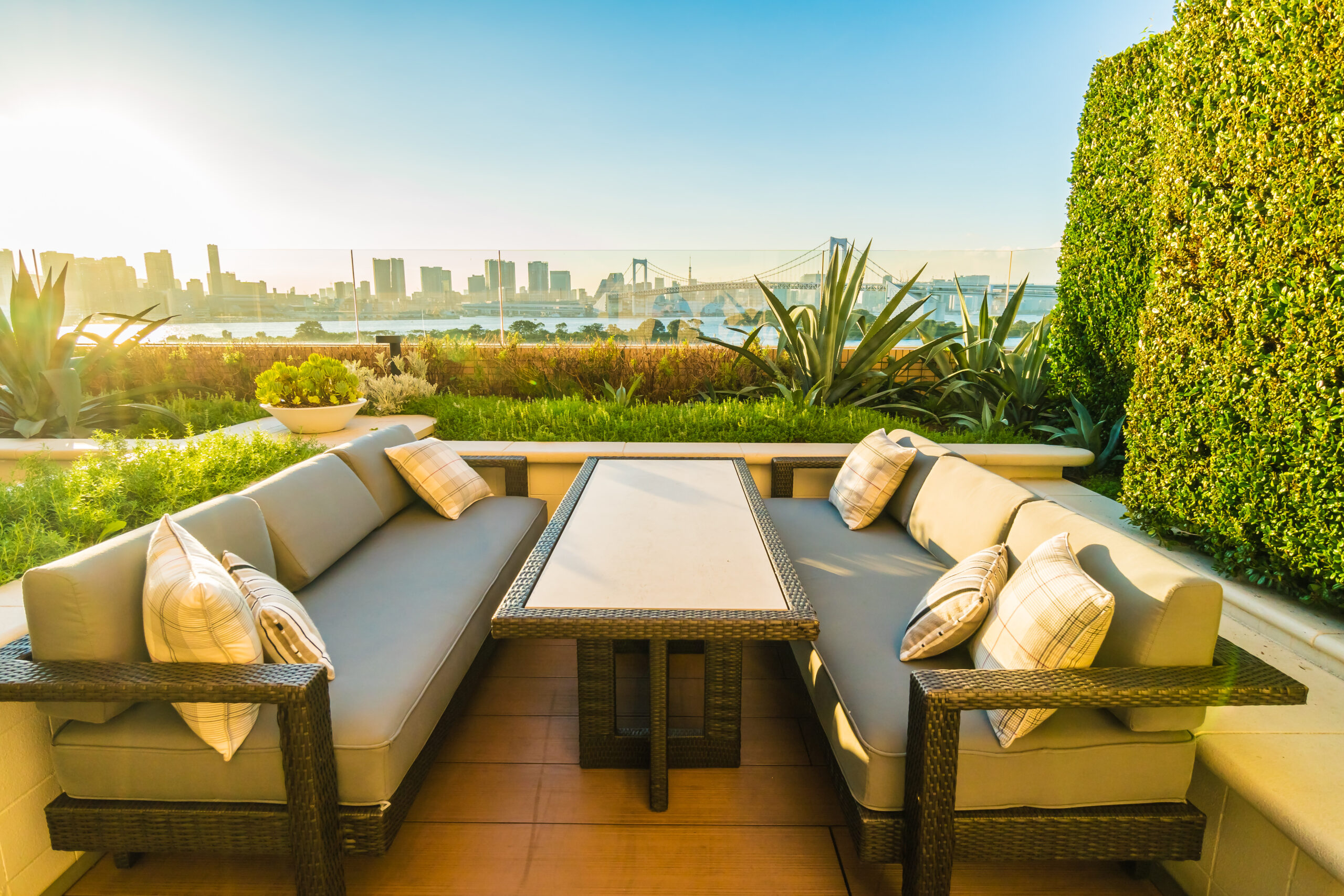 Outdoor patio with table and chair around rainbow